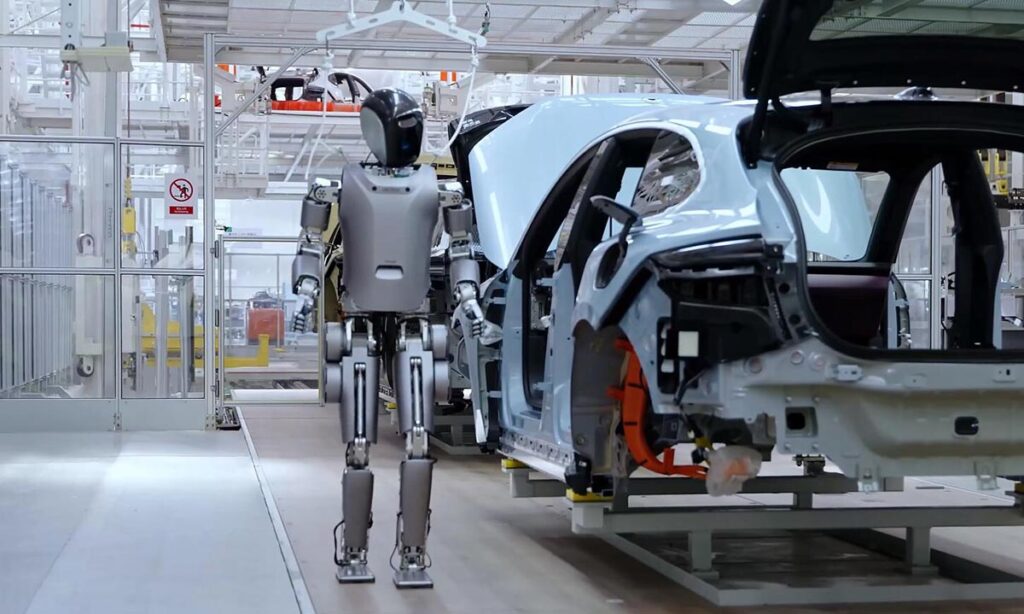 AI humanoid robot working in a high-tech factory in 2025.