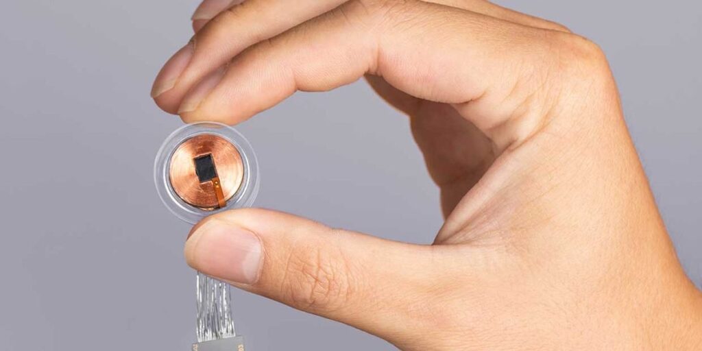 Neuralink's brain-computer interface prototype for human enhancement.