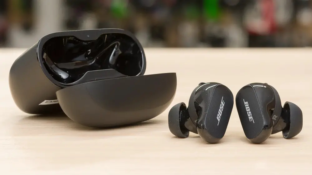 Bose QuietComfort Earbuds II in black color with charging case.