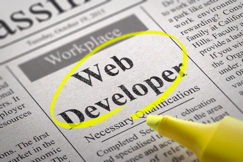 News paper showing web development job